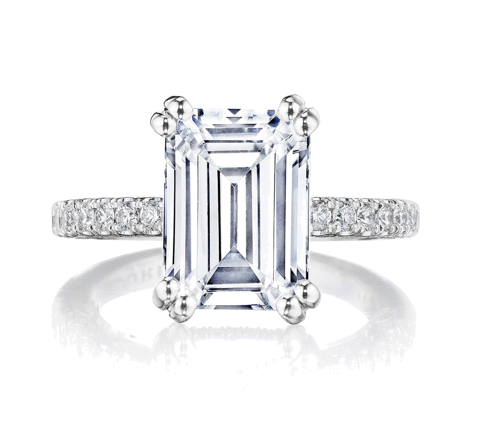 An emerald cut diamond engagement ring by Tacori with a diamond band
