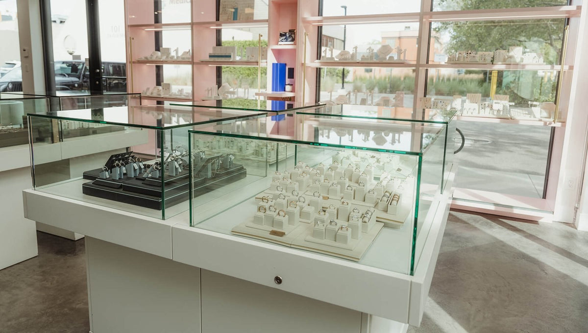 Glass cases of rings in the Perrara showroom in Kelowna